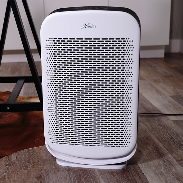 Hunter HP700 Medium Console Air Purifier, White, Sitting in Living Room